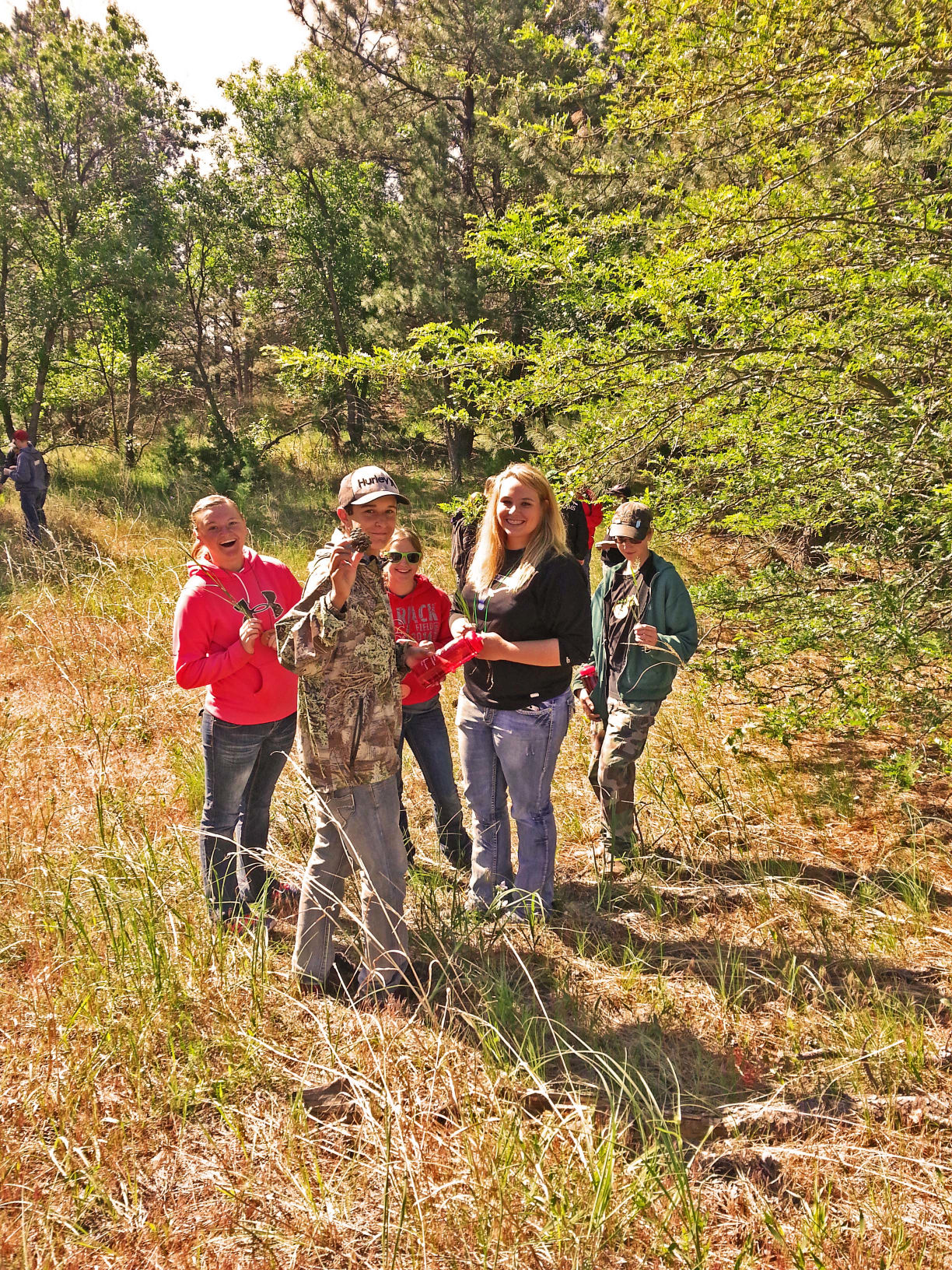 Campers identify plants at the Nebraska Youth Range Camp in 2015. (Courtesy photo.)