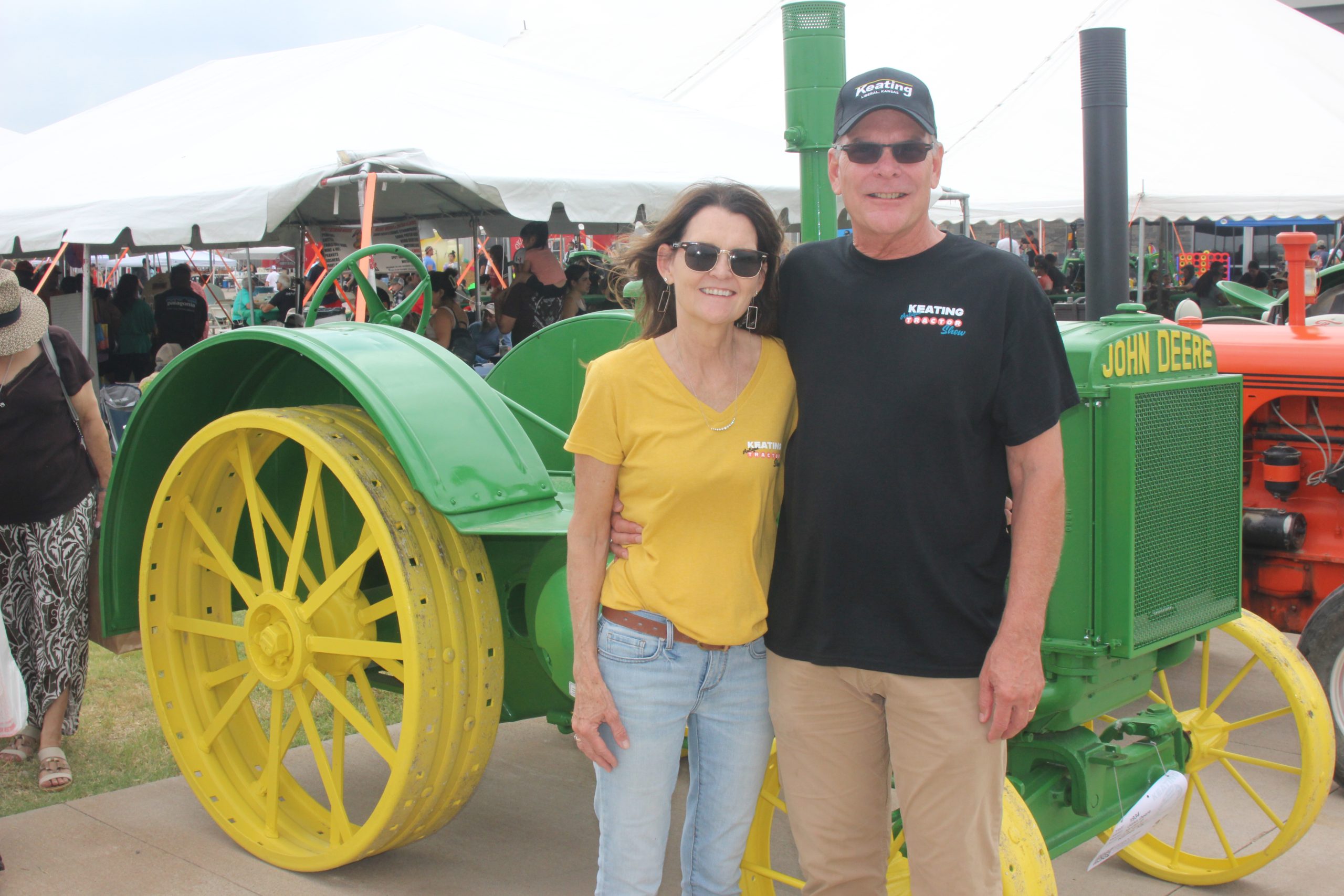 Julie (Keating) Parsons and Russ Keating, Liberal, Kansas, are pictured in front of a favorite tractor on display—a 1934 John Deere Model D owned by J.A. Waters from Kismet, Kansas. (Photo by Dave Bergmeier.)