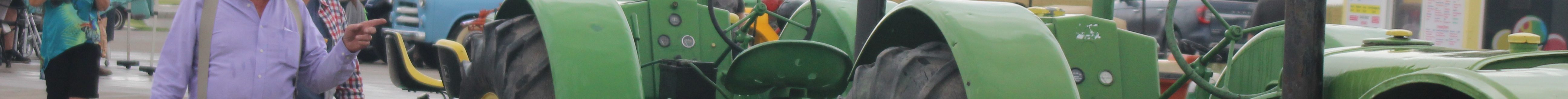 A line of tractors was a popular attraction at Keating Tractor’s antique machinery show that coincided with the farm equipment dealer’s 65th anniversary in Liberal, Kansas. (Journal photo by Dave Bergmeier.)