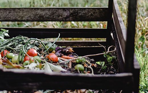 A bin helps to keep compost materials packed together, says Kansas State University horticulture expert Ward Upham. (Photo courtesy of K-State Research and Extension.)