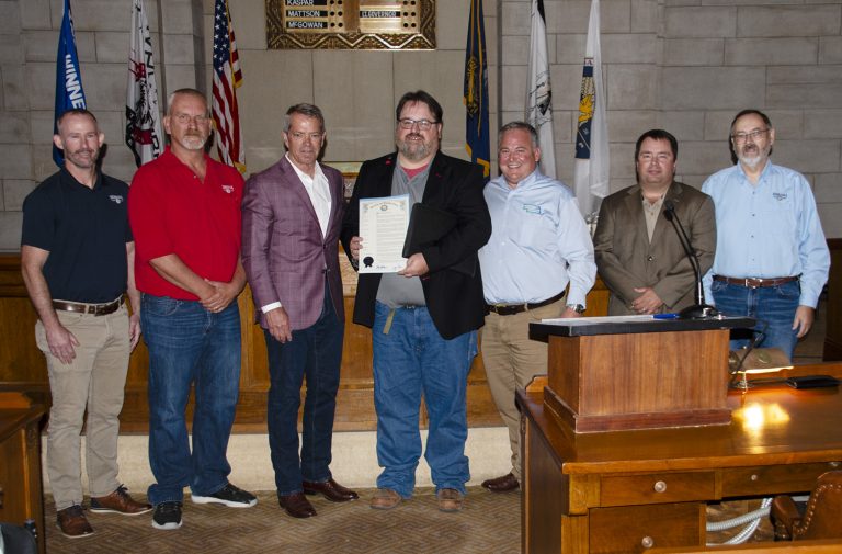 Gov. Jim Pillen recently proclaimed Sept. 23, as National Hunting and Fishing Day in Nebraska. He presented the proclamation to John T. Heaston, executive director of the Nebraska Sportsmen’s Foundation. Also present were Dustin Allemann, Nebraska Sportsmen’s Foundation board chairman, third from right, and the Nebraska Game and Parks Commission’s Tony Barada, left, T.J. Walker, second from left, Jeff Rawlinson, second from right, and Dean Rosenthal, right. (Photo courtesy of Nebraska Game and Parks Commission.)