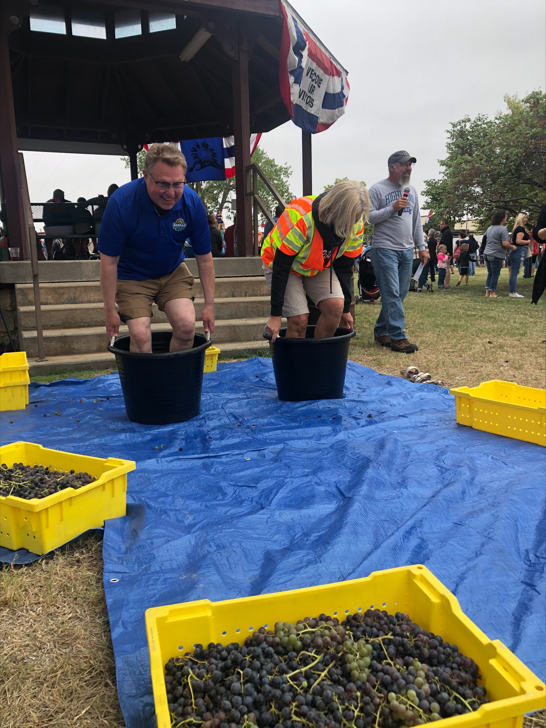 Secretary of Agriculture Mike Beam competed against then-Secretary of Transportation Julie Lorenz during the 2022 Kansas Grape Stomp at the Kansas State Fair in Hutchinson. (Photo courtesy of Kansas Department of Agriculture.)