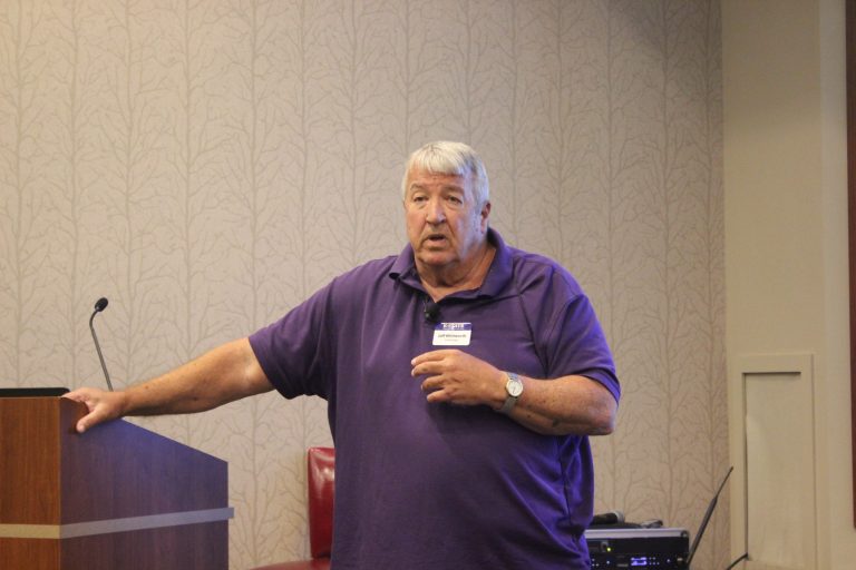 Jeff Whitworth, associate professor of entomology at Kansas State University, discusses the insects that have been the most prevalent in wheat and sorghum the last few years. (Journal photo by Lacey Vilhauer.)