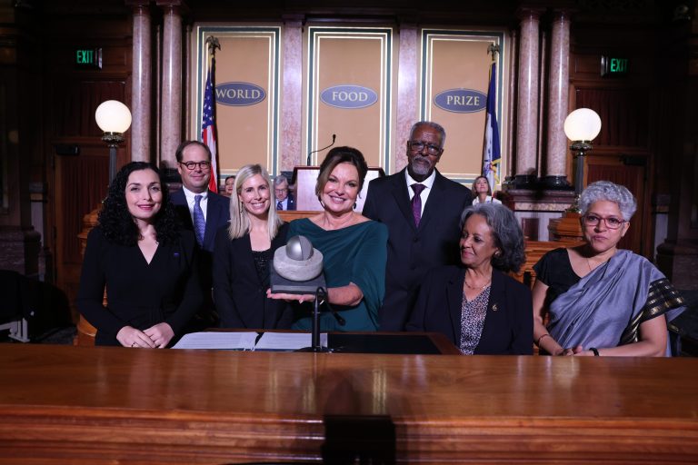 2023 Laureate Heidi Kuhn with her memento. (Photo courtesy of World Food Prize Foundation.)