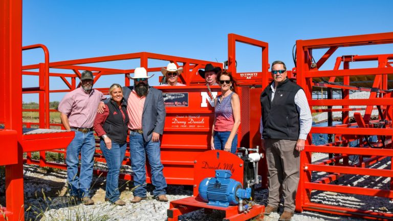 Daniels Manufacturing Company donated cattle working facilities to the University of Nebraska—Lincoln's new Klosterman Feedlot Innovation Center at the Eastern Nebraska Research, Extension and Education Center (ENREEC) near Mead, Nebraska. Left to right: Josh Benton, Feedlot Unit Manager at ENREEC; Ruth Woiwode, UNL Assistant Professor of Animal Science; Kade Blake, Daniels Manufacturing Sales Manager and Design Consultant; Mark Shaul, Daniels Manufacturing Co. board of directors; Tim Iverson, Daniels Manufacturing Co. board of directors; Teri Daniels, Daniels Manufacturing Co. owner and board of directors, and Doug Zalesky, Director of ENREEC. (Photo courtesy of University of Nebraska-Lincoln's Institute of Agriculture and Natural Resources.)
