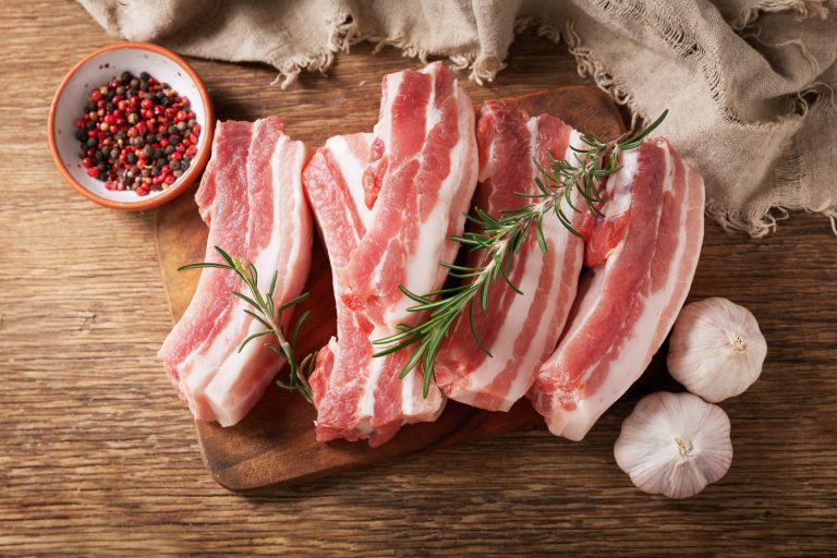 Massachusetts imports nearly all of their pork products. (Photo via Adobe Stock.)
