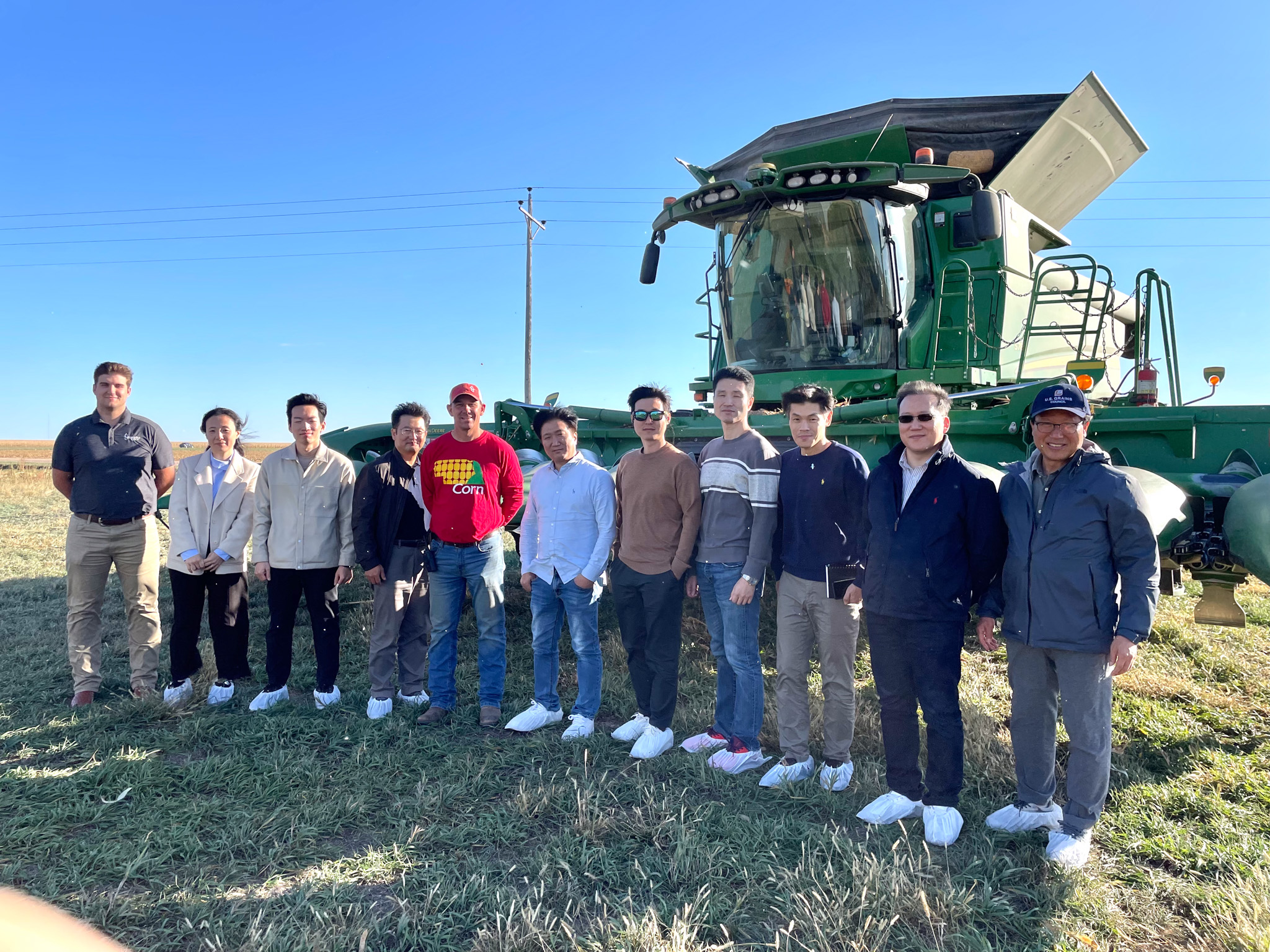 A trade team from South Korea visited Jason Lewis, a farmer from Henderson, and Nebraska Corn Board staff, Payton Schaneman.(Photo courtesy of Nebraska Corn Board.)