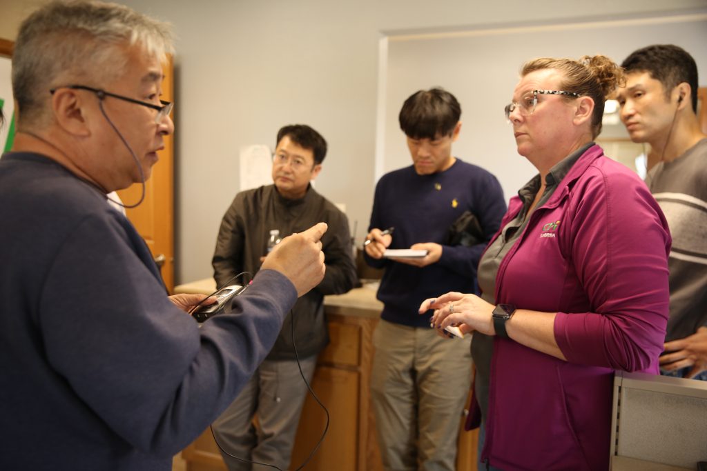 Members of the South Korea trade team had the opportunity to visit with Cooperative Producers, Inc. to see the process of crops being delivered from the field. (Photo courtesy of Nebraska Corn Board.)

