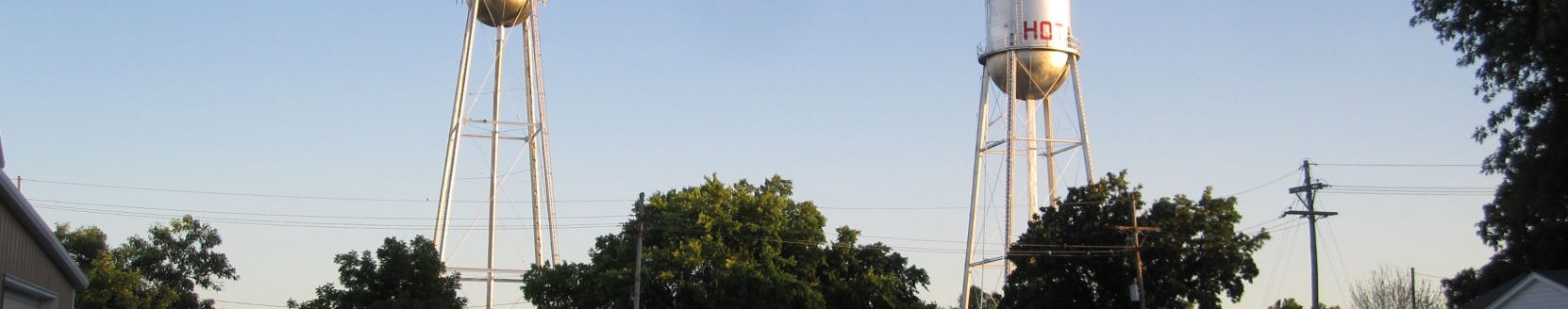 The twin water towers of Canton, Kansas, were recently repainted, according to Linda Klatt, city clerk. While one is labeled hot and the other cold, the water within both is actually the same temperature. (Journal photo by Jennifer Theurer.)