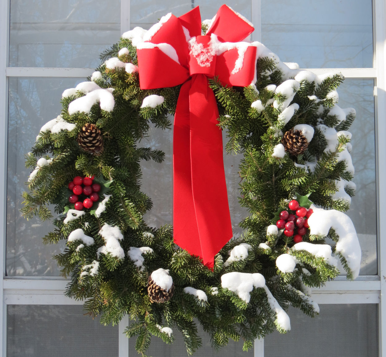 A homemade wreath can really brighten a holiday gathering and is not difficult to make. (Courtesy photo.)