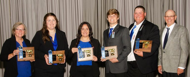 The Missouri 4-H dairy judging team. From left, Karla Deaver (co-coach), Molly Archer, Libby Shaver, Case Melzer, Logan Archer and Ted Probert (co-coach). (Photo courtesy of University of Missouri Extension.)