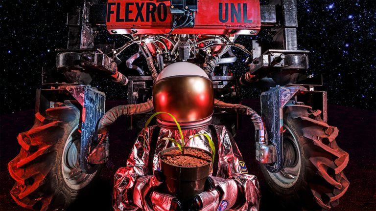 Having developed a suite of technologies for better growing food on Earth—including Flex-Ro, an autonomous planter that can already seed a 5-acre field on its own—a Nebraska team is now looking to apply its agricultural expertise in space. (Graphic by Craig Chandler, University of Nebraska-Lincoln.)