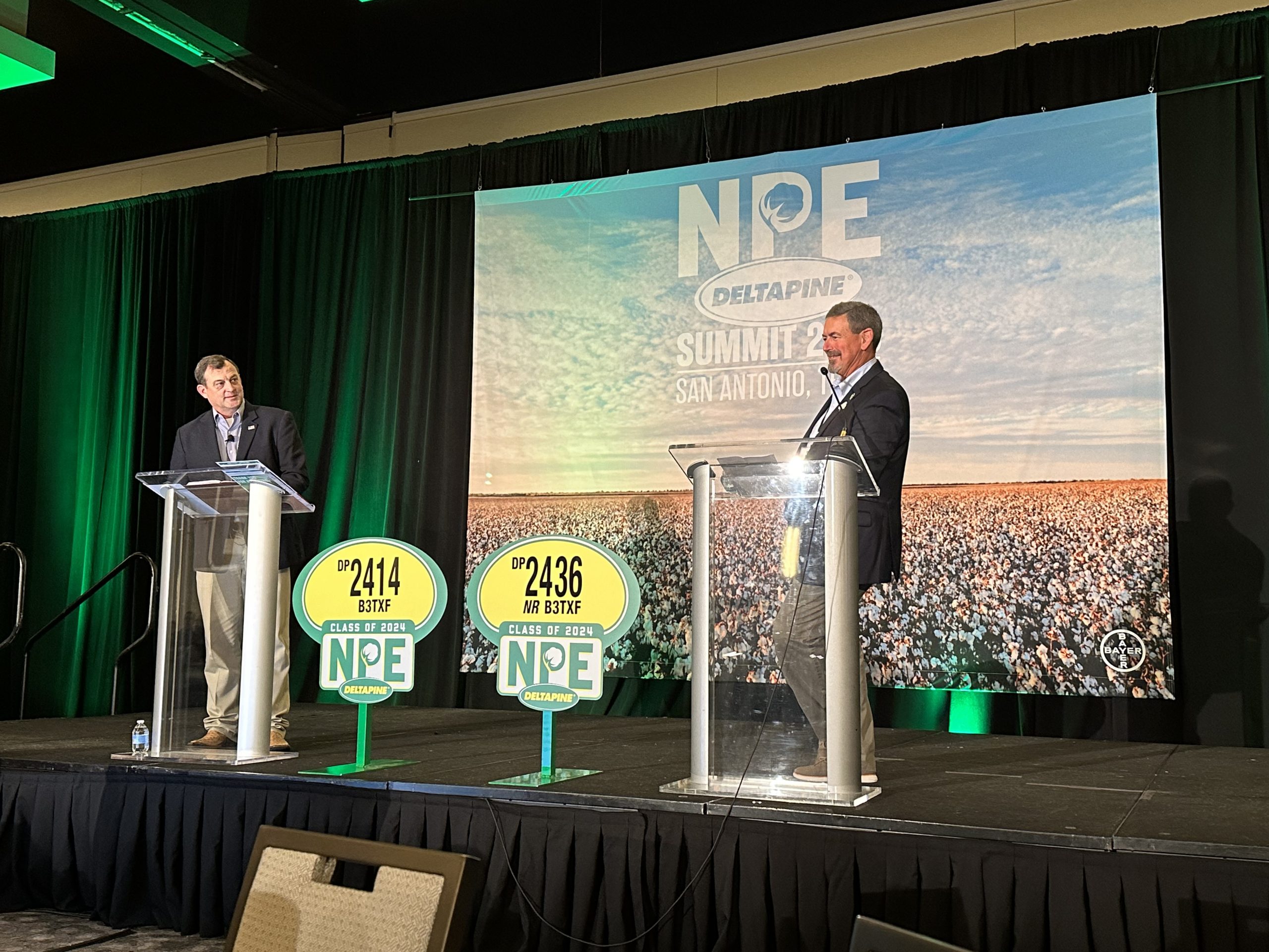 Eric Best, Deltapine cotton product manager and Dave Albers, Deltapine cotton product development manager, announce the class of 2024 Deltapine cotton varieties at NPE Summit in San Antonio, Texas. (Journal photo by Lacey Vilhauer.)