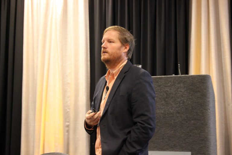 Josh Lofton, Oklahoma State University assistant professor and cropping systems specialist, spoke at the recent Sorghum U Wheat U event in Wichita, Kansas, about promoting soil health in sorghum crops. (Journal photo by Lacey Vilhauer.)