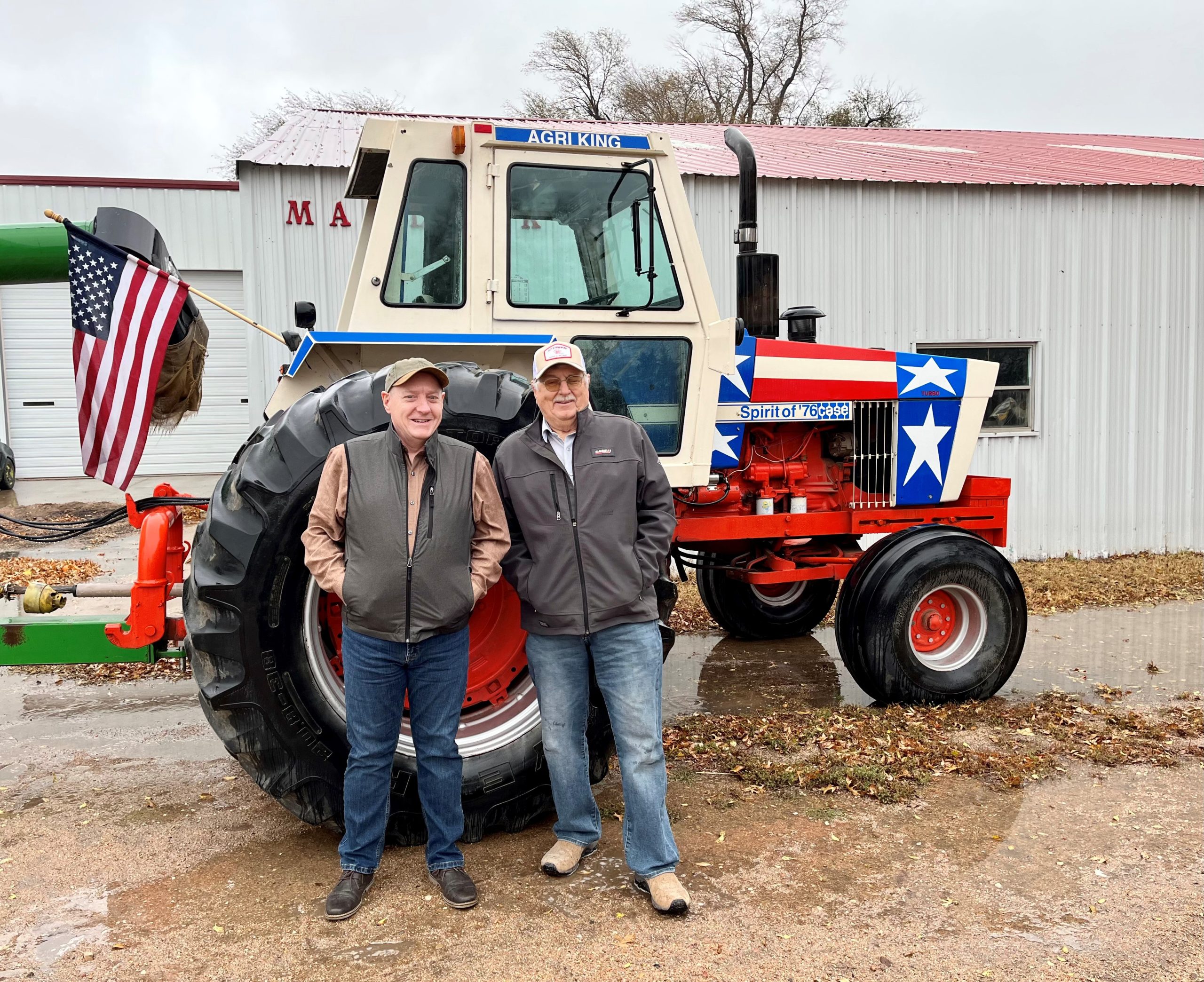(Left) Michael Hinton is pictured with Larry Matlack whose 1976 model Case 1570 is featured on the cover of the Heritage Iron Magazine 2024 calendar. Hinton, who has a passion for antique machinery, took the photo earlier this year. (Courtesy photo.)