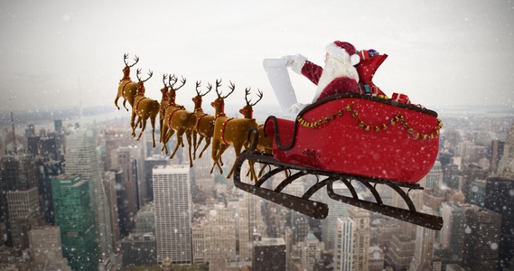 Composite image of santa claus riding on sled during christmas (Image: USDA Animal and Plant Health Inspection Service)