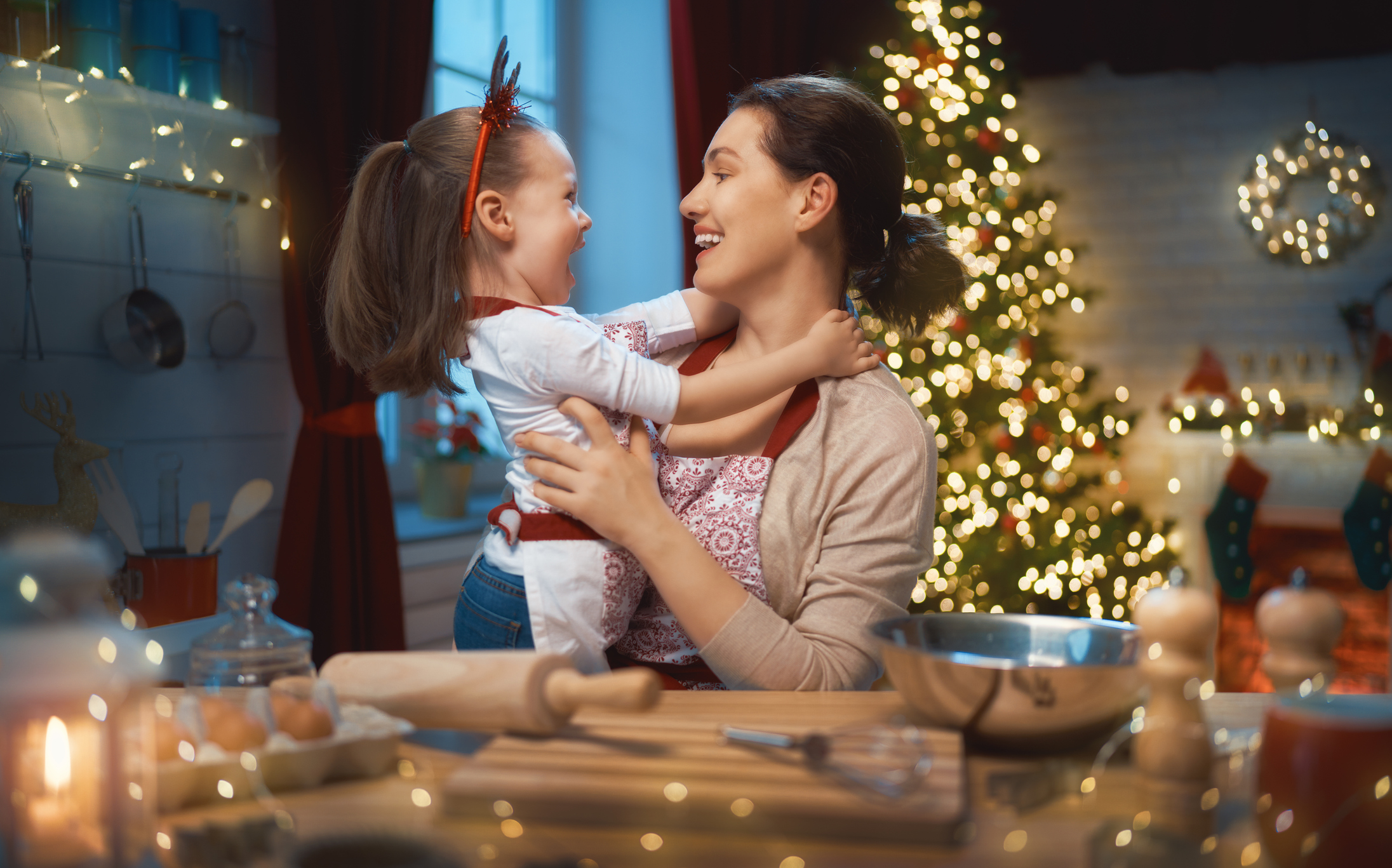 Merry Christmas and Happy Holidays. Family preparation holiday food. Mother and daughter cooking cookies. (Photo: iStock - Choreograph)