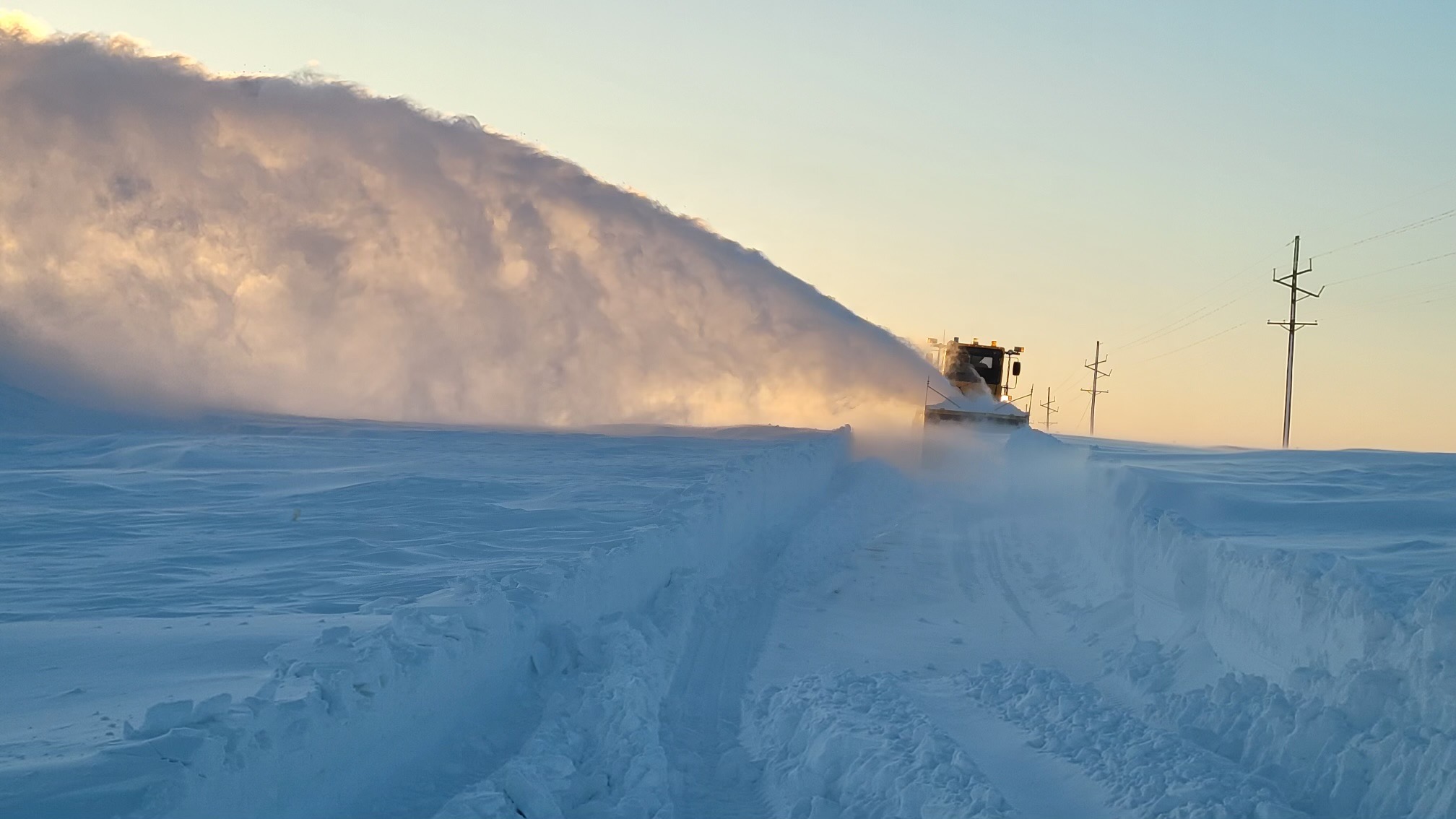 Crews work to clear the snow from Highway 4 west of Bruning, Nebraska. (Photo courtesy of Nebraska Department of Agriculture.)
