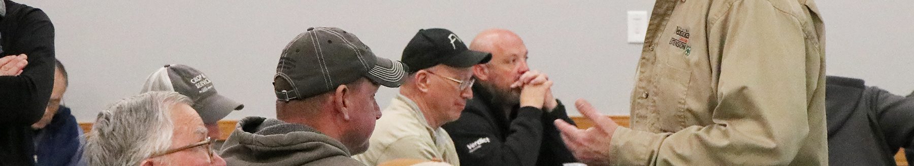 During a break, Bob Harveson, Nebraska Extension plant pathologist, chats with Bob Wilson, University of Nebraska-Lincoln emeritus professor at the Crop Production Clinic in Gering. (Photo courtesy of Nebraska Extension.)