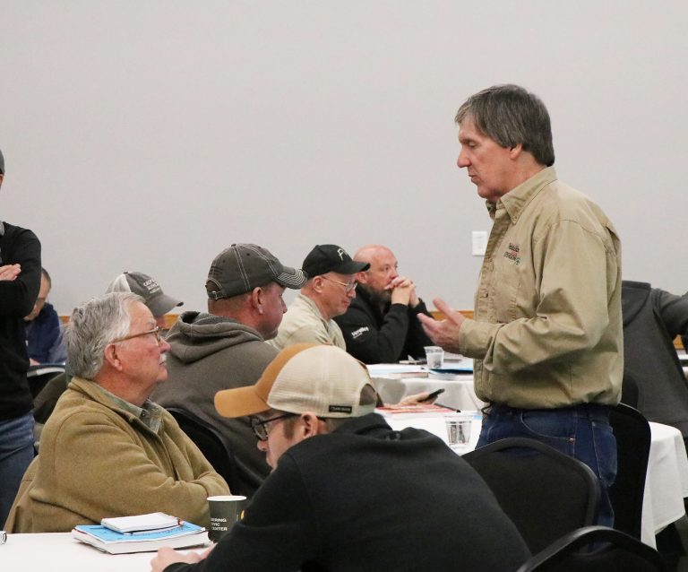 During a break, Bob Harveson, Nebraska Extension plant pathologist, chats with Bob Wilson, University of Nebraska-Lincoln emeritus professor at the Crop Production Clinic in Gering. (Photo courtesy of Nebraska Extension.)