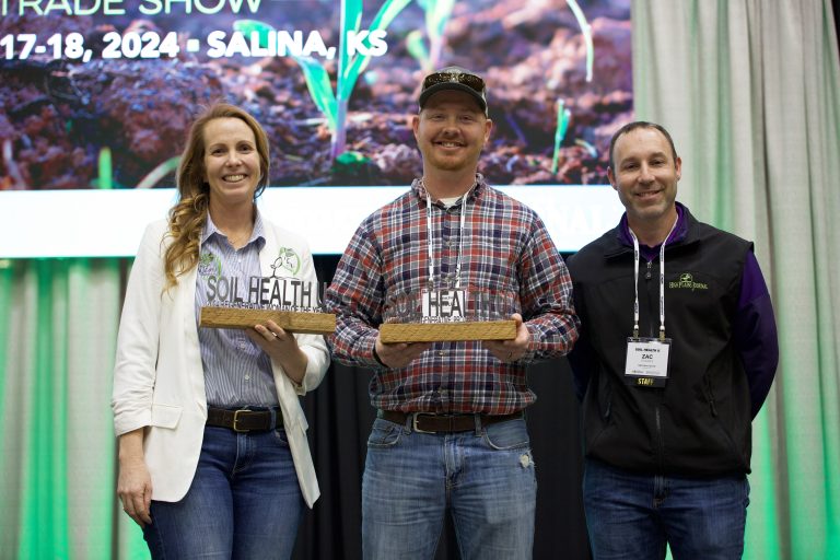 Carolyn Wingate and Marcus Richardson were presented Soil Health U Awards by HPJ Publisher Zac Stuckey. (Journal photo by Kylene Scott.)