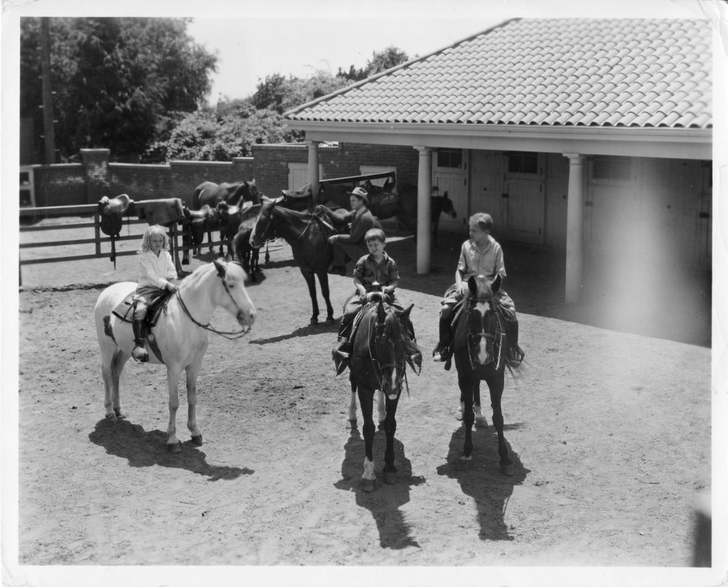 Will Rogers with Will Rogers Jr., Mary Rogers and Jim Rogers on horses named Chapel, Shorty, Dopey and DoDo. (Photo Courtesy Will Rogers Memorial Museum.)
