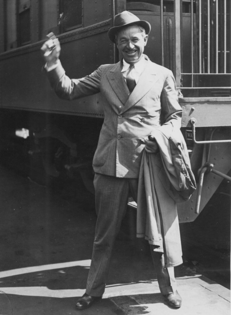 Will Rogers announced himself "as the first Democrat to arrive to attend the Republican Convention." Rogers is pictured as he alighted from his train in Chicago, June 12, 1932. (Photo courtesy Will Rogers Memorial Museum.)