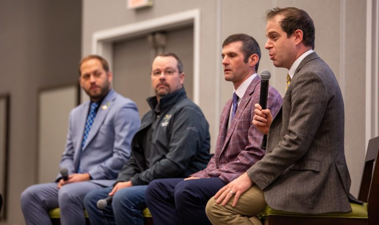 National commodity group staff sat on a panel Jan. 26 at the Kansas Commodity Classic in Salina, Kansas. From right includes: Kyle Kunkler, American Soybean Association; Craig Meeker, National Sorghum Producers; Chris Tanner, Kansas Association of Wheat Growers and Wayne Stoskopf with the National Corn Growers Association. (Journal photo by Kylene Scott.)