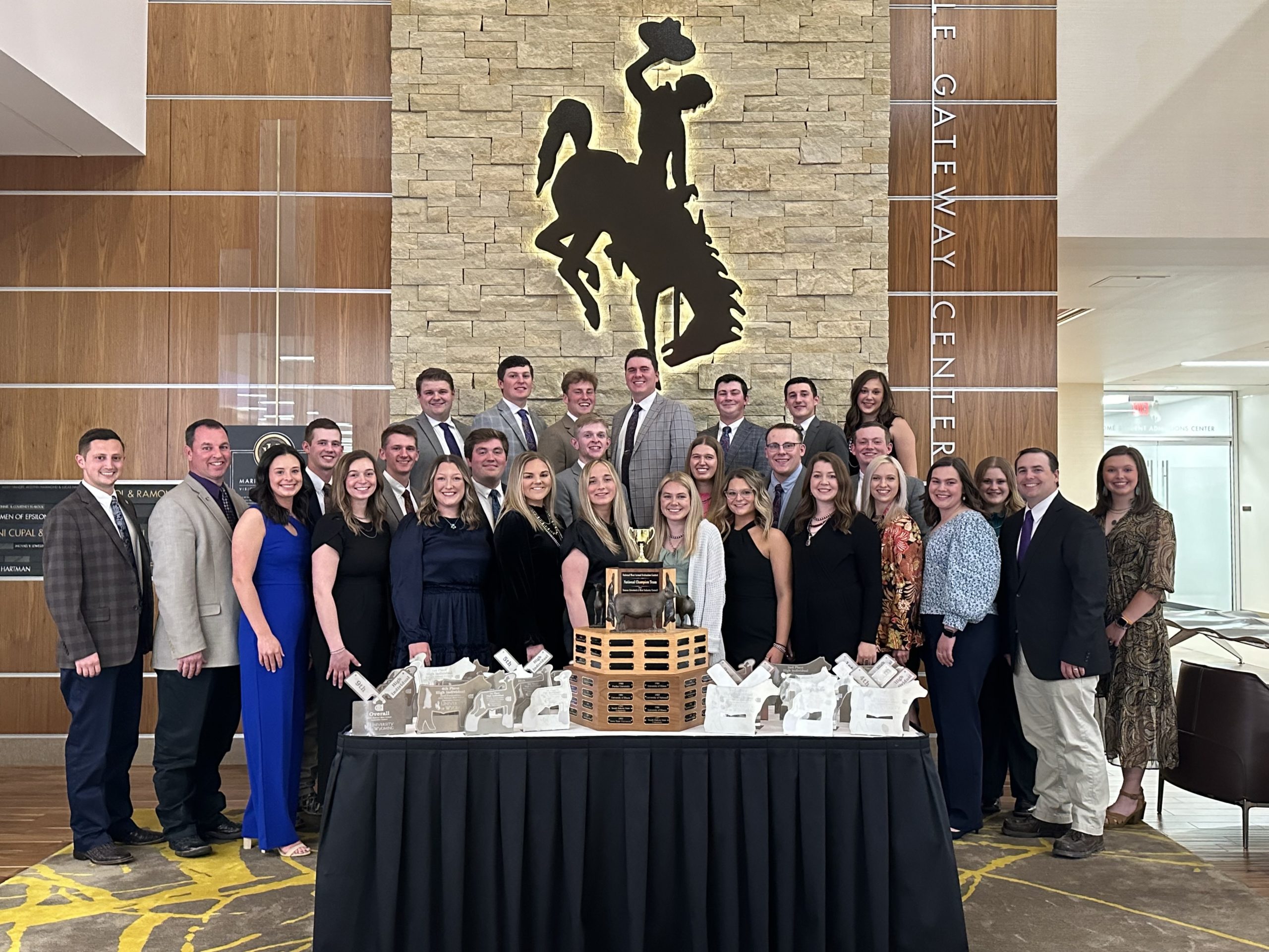 Members of the national champion meat animal evaluation team from Kansas State University are from left (back row) Benjamin Archer, Ty Knodle, Chanse Mullinix, Ethan Hyers, Sam Stickley, Cole Murphy and Kyla Mennen; (middle row) Blake Bruns, Logan Topp, Logan Buhrman, Hayden Deno, Ava Perrier, Jacob Klaudt, Zane Redifer, Riley Coates and Emerson Tarr; (front row) coaches Payton Dahmer and Chris Mullinix; Sadie Marchiano, Katelyn Wallace, Kylie Schakel, Olivia Gerloff, Quinna Molden, Bailey Lavender, Chevy Vaske, Hailey Gillespie, Sydney Stolee, Lauren Thompson and coach Travis O’Quinn. (Courtesy photo.)