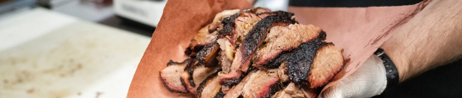 Texas barbecue has become an iconic culinary and cultural dish. The Brisketeers and pitmasters around the state continue to push the boundaries of the low and slow science behind barbecue. (Courtney Sacco, Michael Miller/Texas A&M AgriLife)
