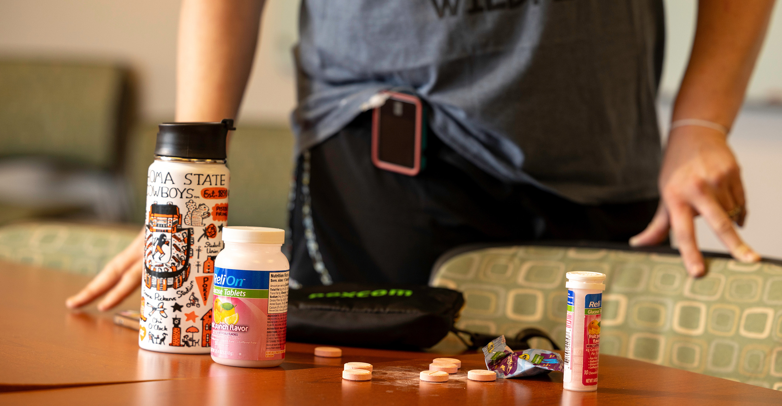 Before participating in outdoor activities in the summer heat, people with diabetes need to keep a few emergency supplies on hand, including fruit snacks, glucose tablets and a water bottle. (Photo by Mitchell Alcala, OSU Agriculture)