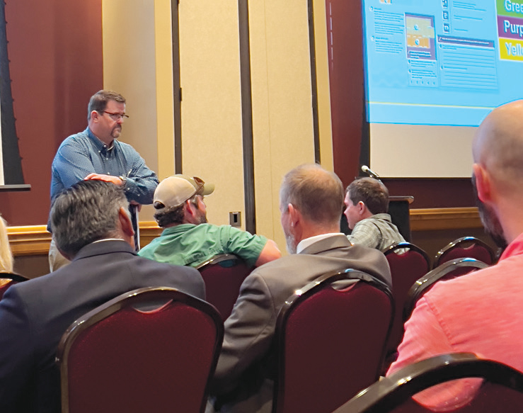 Russell Plaschka, Agriculture Marketing Director for the Kansas Department of Agriculture facilitiates a breakout session at the Kansas Water Office’s strategic planning session June 18 in Dodge City, Kansas. (Journal photo by Kylene Scott.)