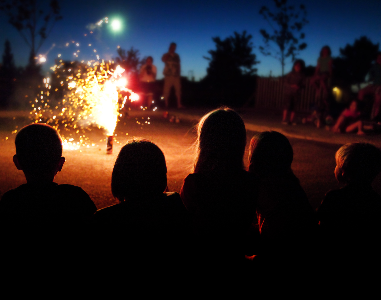 Kids Watching Fireworks (Photo: iStock - Renphoto)