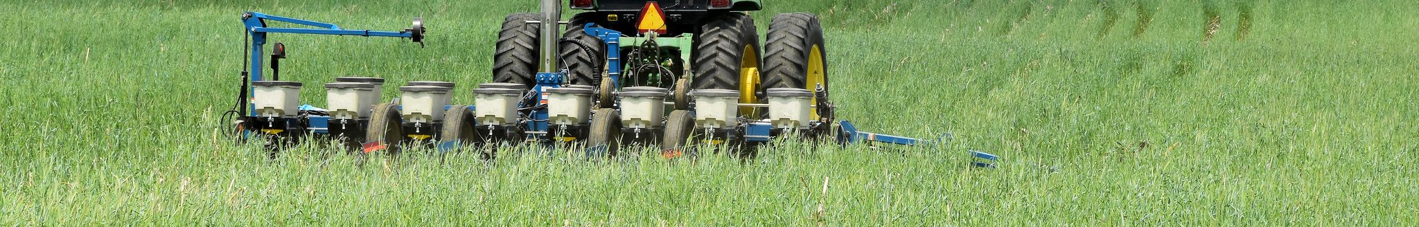 A farmer plants soybeans into a cover crop stand of cereal. (Photo courtesy of Jason Johnson/Iowa NRCS)