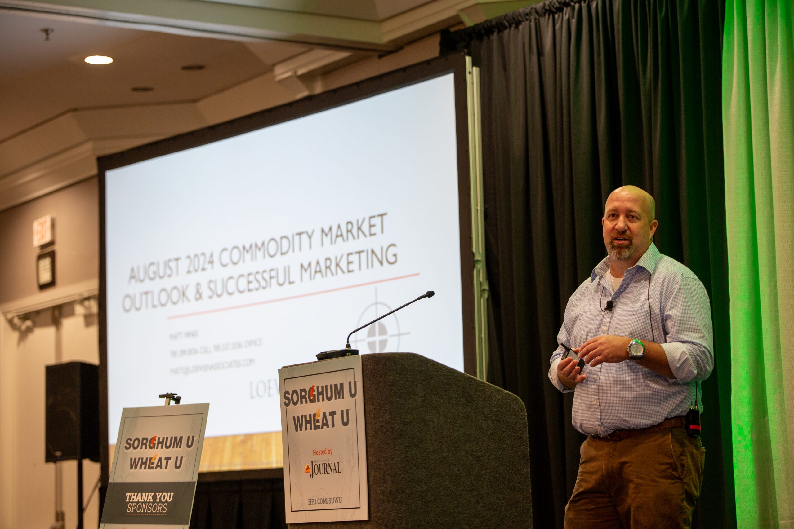 Matt Hines, principle and licensed commodity broker with Loewen and Associates, Inc., gave the keynote address at Sorghum U/Wheat U, Aug. 13 in Wichita, Kansas. Hines discussed market history and gave his outlook for wheat and grain sorghum during his segment. (Journal photo by Kylene Scott.)