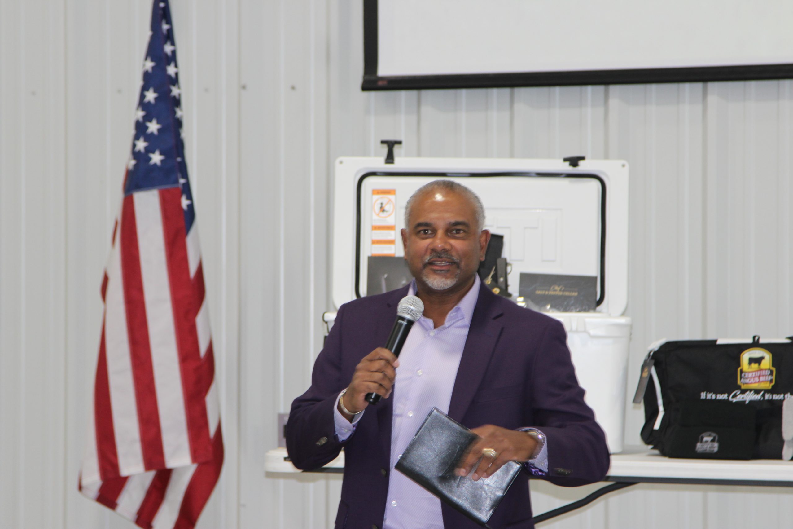 Kansas State University men’s head basketball coach Jerome Tang spoke to livestock producers Aug. 21 at the Hy-Plains Feedyard research center. (Journal photo by Dave Bergmeier.)