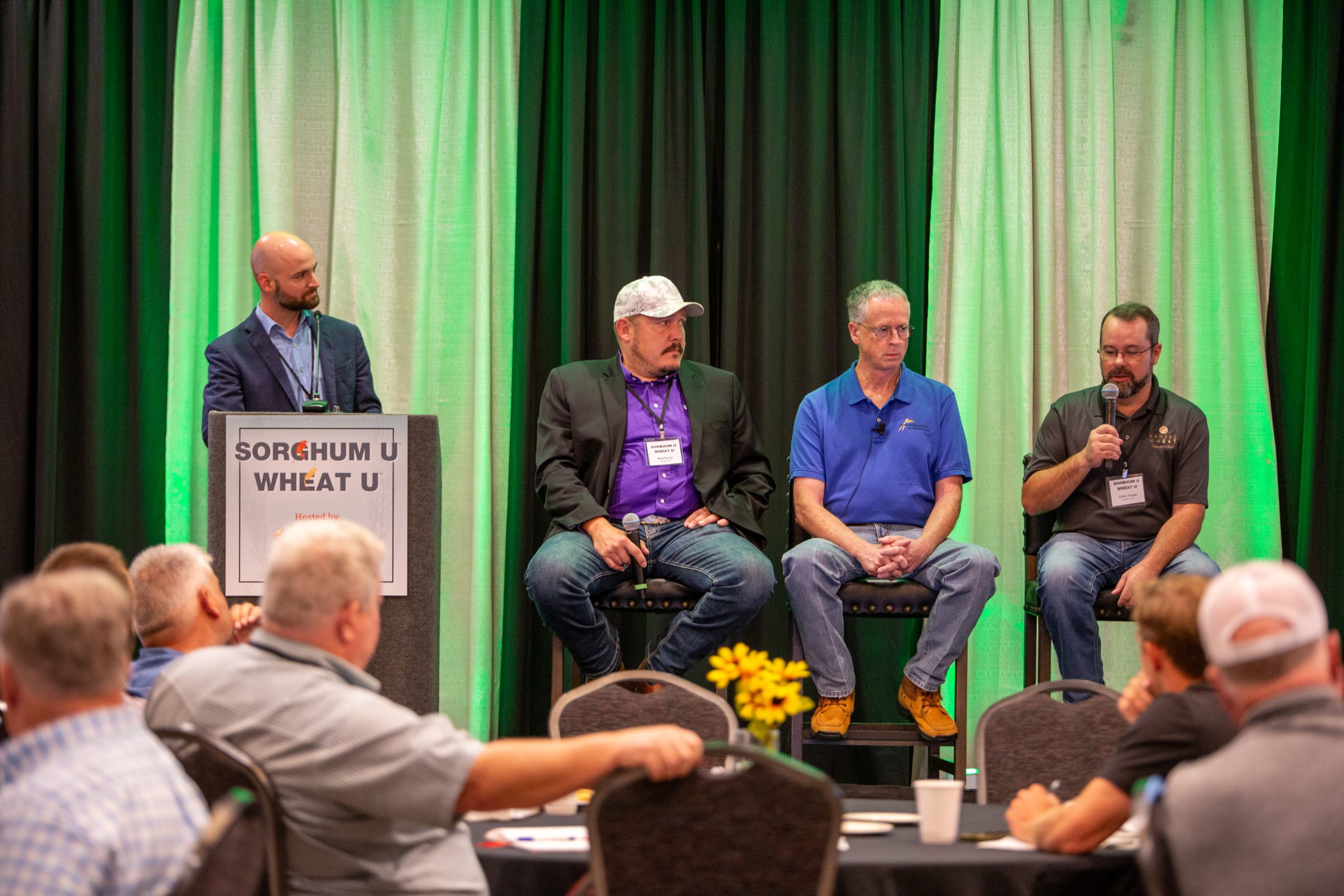 The producer panel kicked off Sorghum U/Wheat U first thing Aug. 13 in Wichita, Kansas. Adam York, Kansas Sorghum CEO moderated the panel which included Matt Durler, a Ford County, Kansas farmer and managing director of Climate Smart Sorghum with National Sorghum Producers, Keefe Felty, president of the National Association of Wheat Growers and Chris Tanner, vice president of the Kansas Wheat Commission. (Journal photo by Kylene Scott.