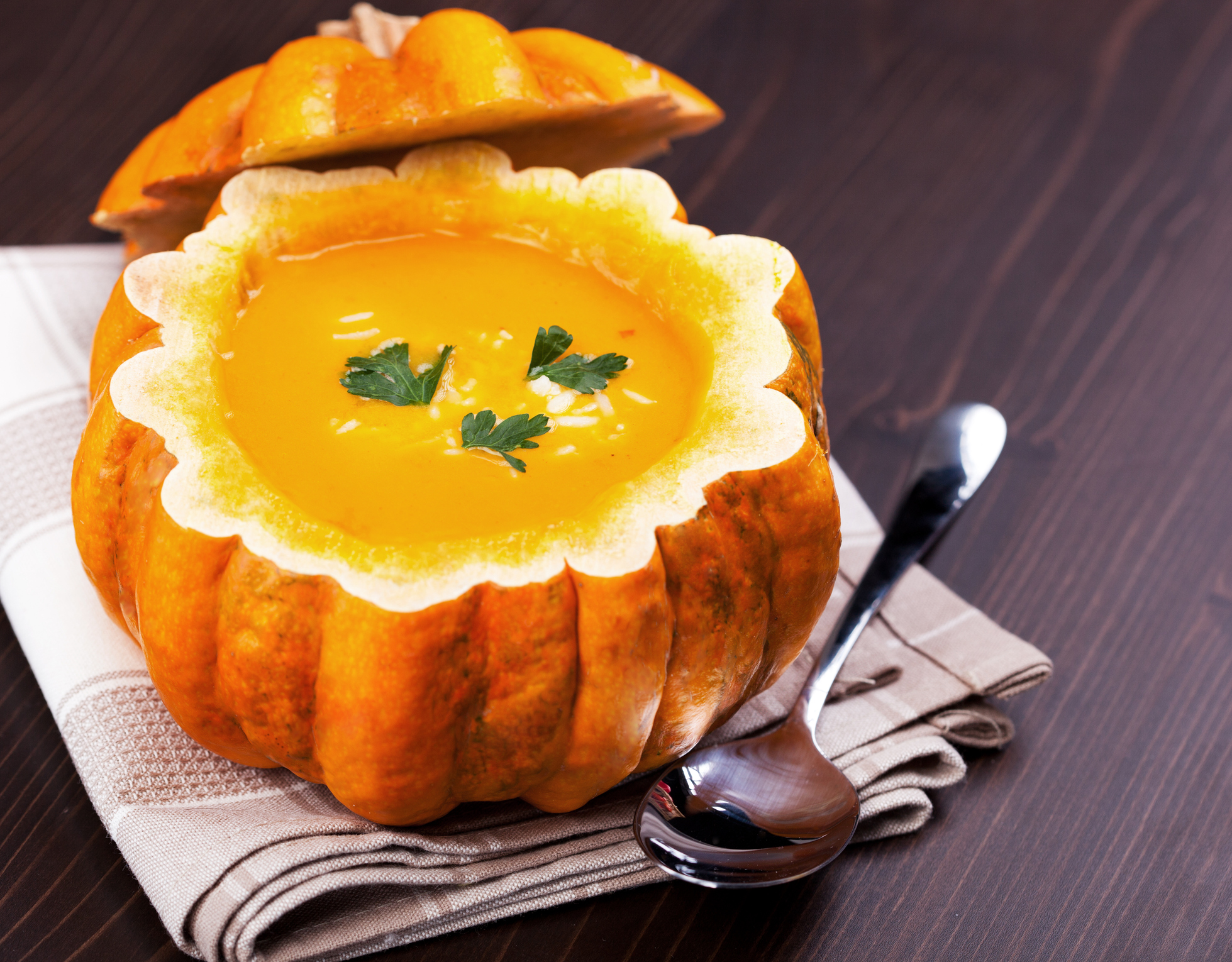 Pumpkin soup served in pumpkin (Photo: iStock - GMVozd)