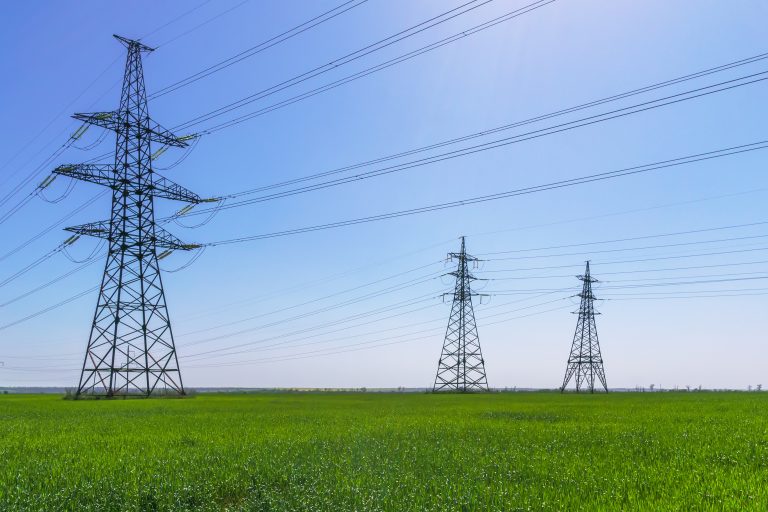 High-voltage power lines. High voltage electric transmission tower. (Photo: Adobe Stock │ #249982315 - yelantsevv)