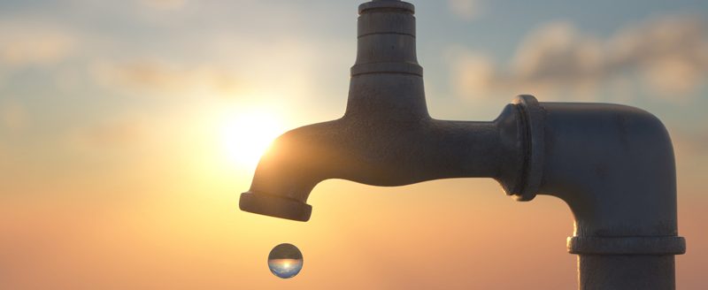 Dripping outside tap in summer showing a conceptual water ban or shortage 3d render (Photo: iStock - studio-fi)