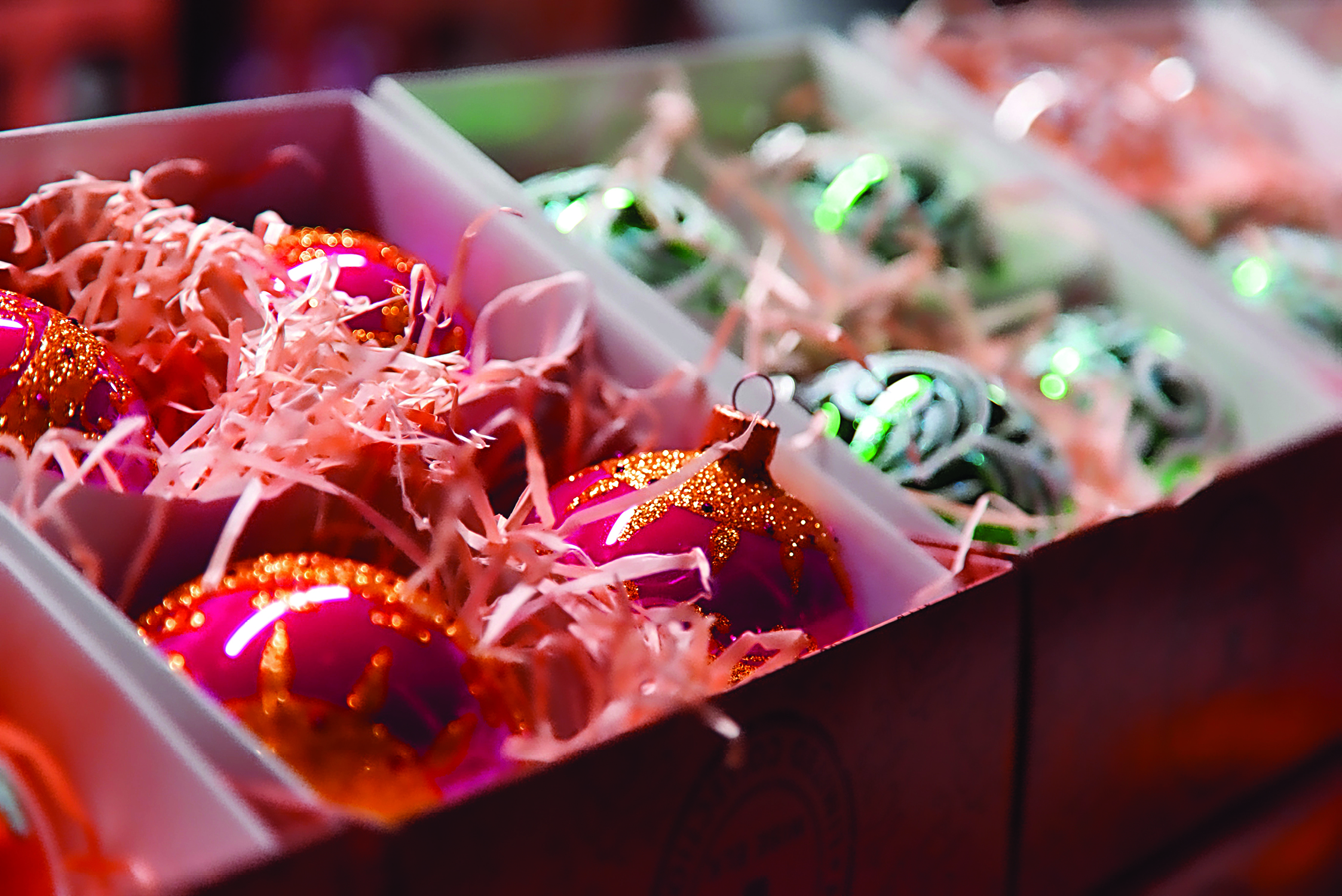 Boxes of Christmas ornaments. (Photo courtesy of Unsplash)