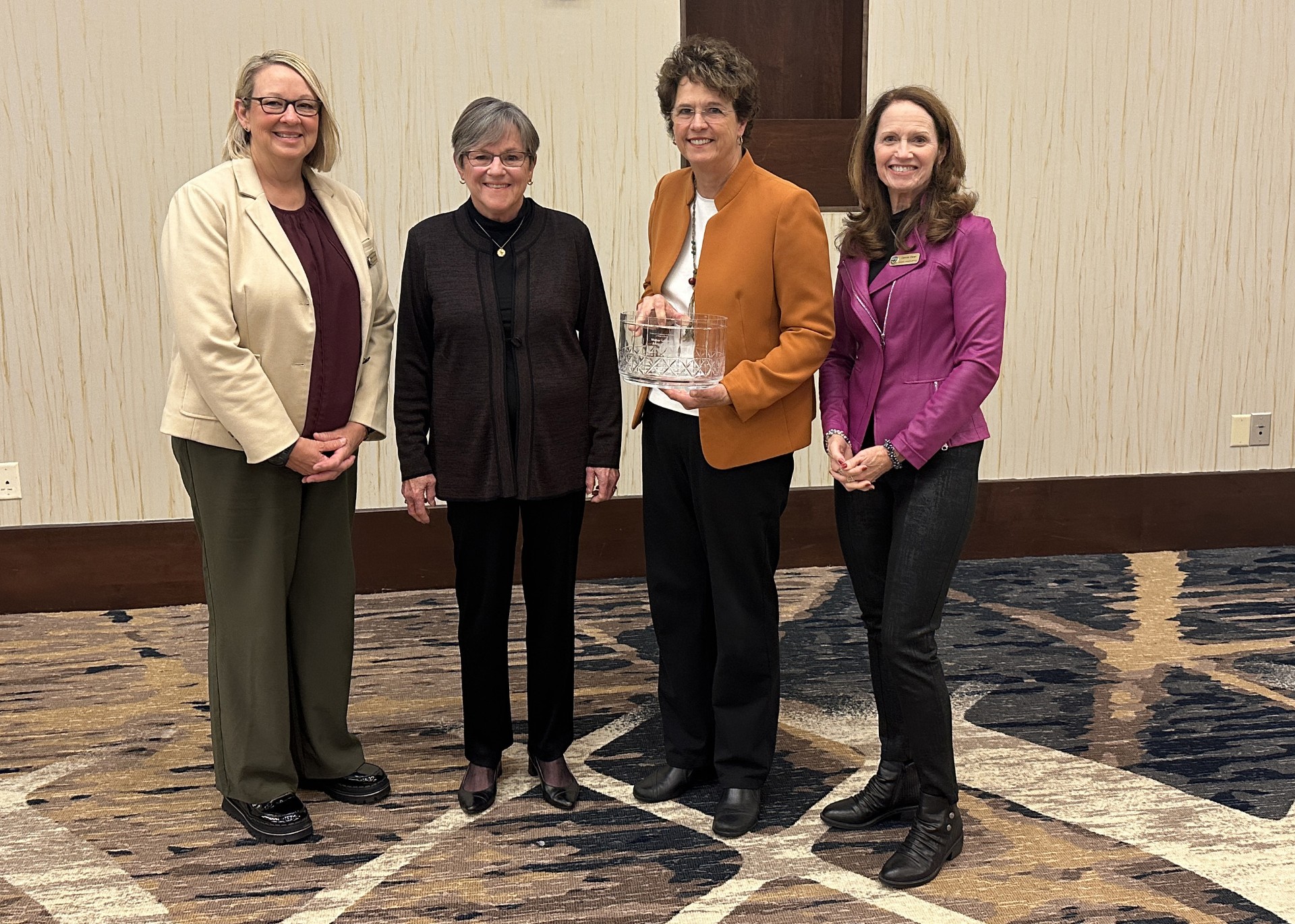 Sen. Carolyn McGinn, second from right, earned the 2024 Kansas Water Legacy Award at the Governor’s Water Conference Nov. j14 in Manhattan. She is pictured with Dawn Buehler, chair of the Kansas Water Authority; Kansas Gov. Laura Kelly and Connie Owen, director of the Kansas Water Office. (Photo by Bill Spiegel.)