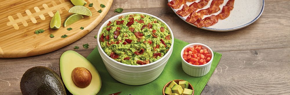Because it's not game day without guac, start the party by mashing up a bowl of Championship Guac. (Photo: Family Features)
