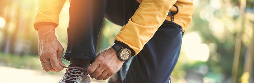 Man jogging in the park. (Adobe Stock │ #296934644 - sebra)