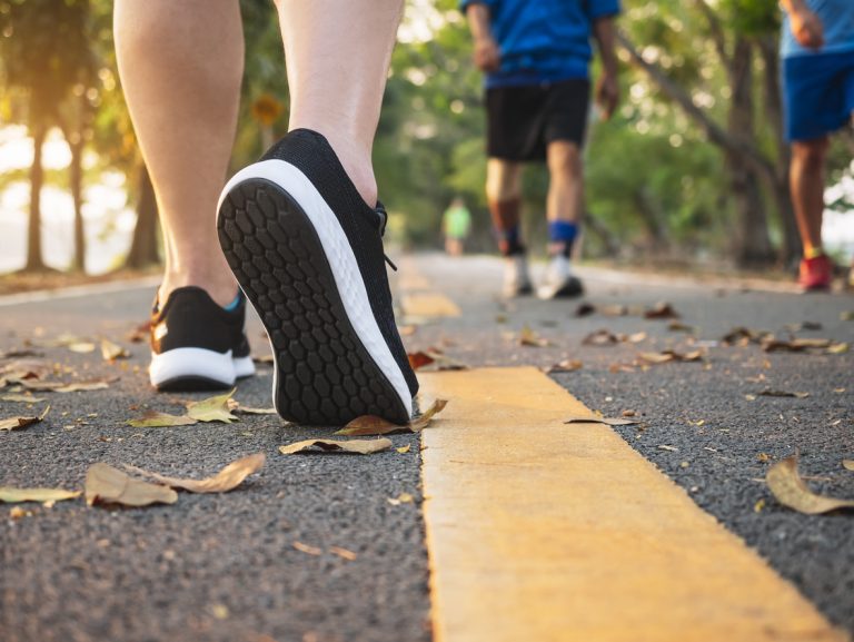 Man walk in park outdoors. (iStock │ #1144757222 - VTT Studio)