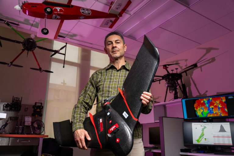 Sorin Popescu, Ph.D., holds a UAV in his lab. Popescu is a leading expert in remote sensing and within the ecoinformatics field. He believes the future of natural resource conservation and land management will be guided by data and computer modeling. (Michael Miller/Texas A&M AgriLife)