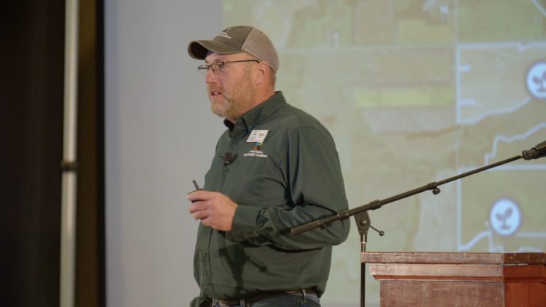 Twin Brooks, South Dakota, farmer David Kruger explained how he earns more profit per acre by using a corn-soybean-wheat crop in no-till fields compared to a corn-soybean rotation in conventionally tilled fields at the 2025 Soil Health Conference in Watertown, South Dakota. (Photo courtesy of South Dakota Soil Health Coalition.)