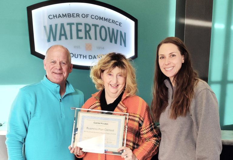 Tim Sheehan, Watertown Area Chamber of Commerce president; Carrie Holden, Small Business Basics contest winner; and Kara Harders, SDSU Extension Community Vitality Field Specialist. (SDSU Extension photo)