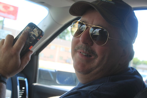 Dad trying to pull off my aviators.