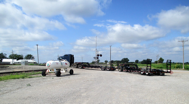 the guys move a combine trailer